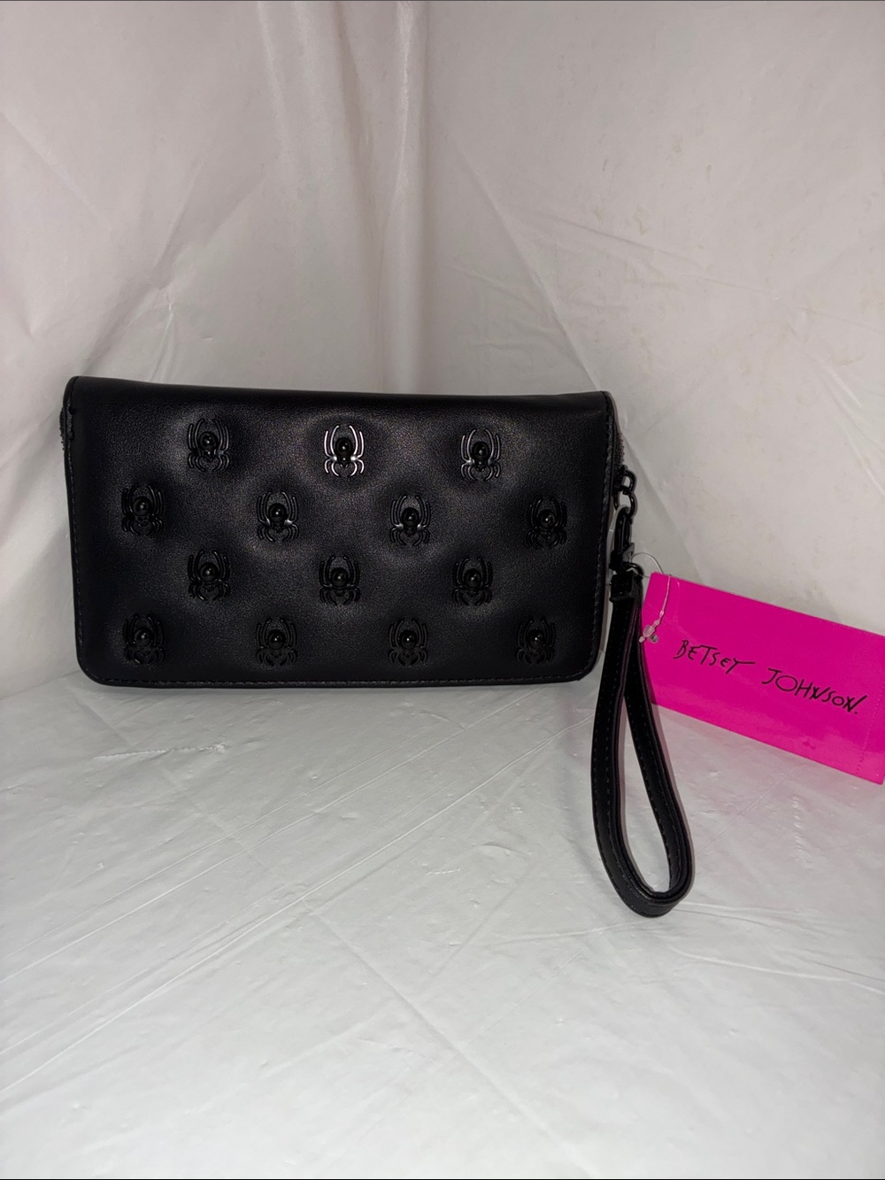 Betsey Johnson Black Wristlet Clutch with Embossed Skull Motif